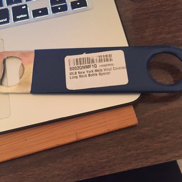 "I open up the box like a child on christmas' morn. I see that there is some kind of shipping sticker on the opener. no big deal, I think to myself, mouth thirsty for beer. hand ready to open beer with new mets opener."