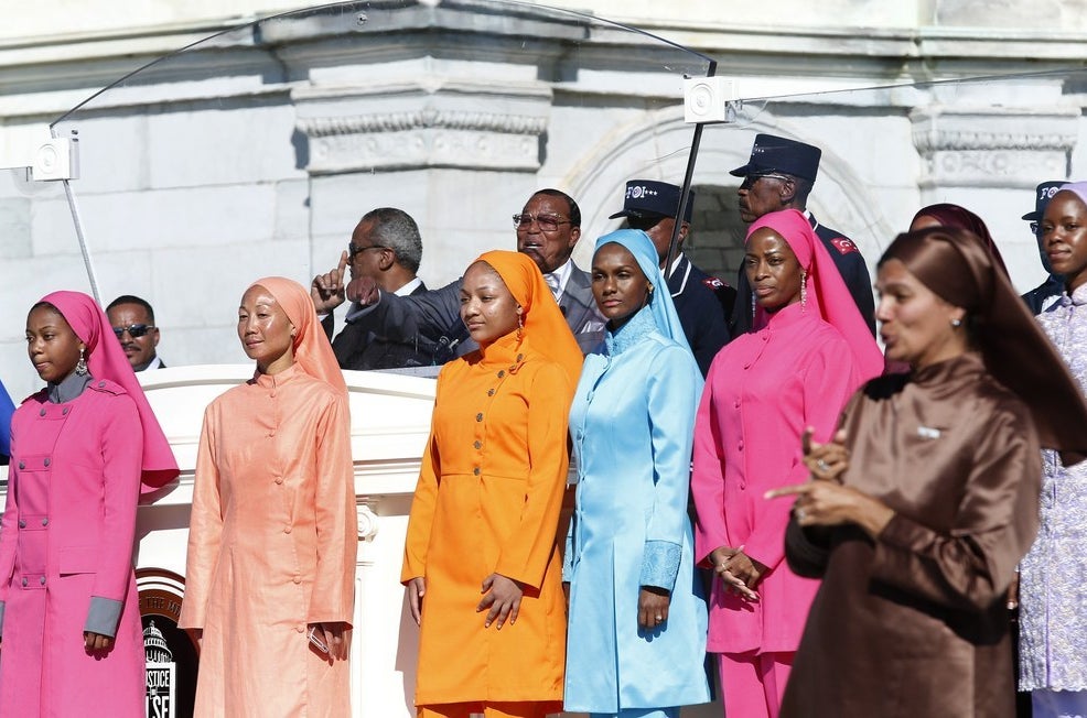 Farrakhan brings out examples of &quot;perfect women&quot; during his speech in 2015.