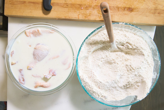 Transfer the chicken to a large bowl and add the buttermilk, then let it sit for at least 15 minutes. Meanwhile, stir together the flour with the seasonings.