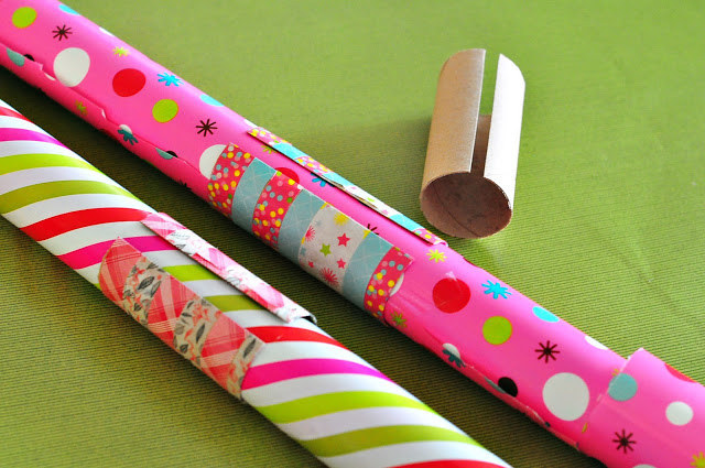 Solution: Cut old toilet paper rolls lengthwise, and use them to hold the paper in place. If you're really feeling crafty, you can even decorate the rolls with washi tape, as seen on The Cheese Thief!