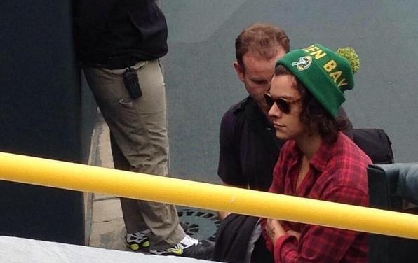 Harry in a Green Bay Packers jersey