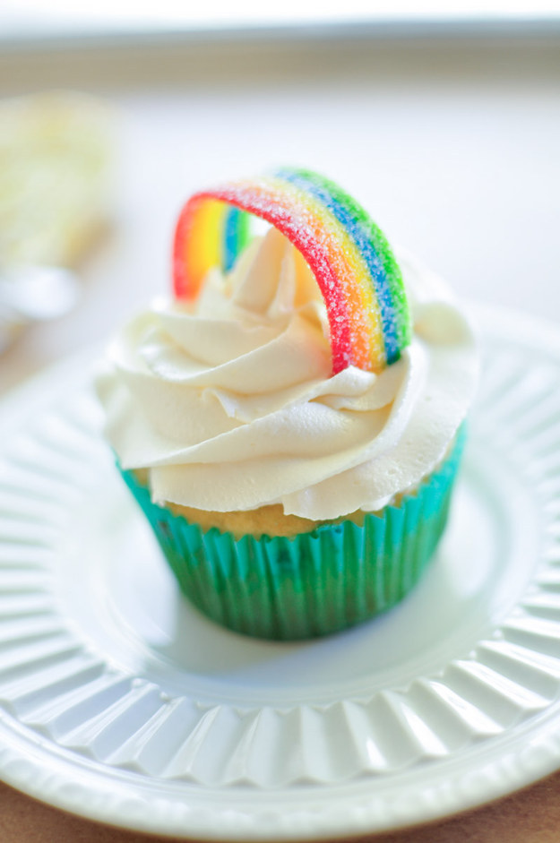 Top a fluffy white cloud of frosting with a candy rainbow.