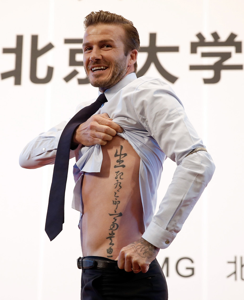 David Beckham Gets Jay Z Lyric Tattoo See the Pic  E Online