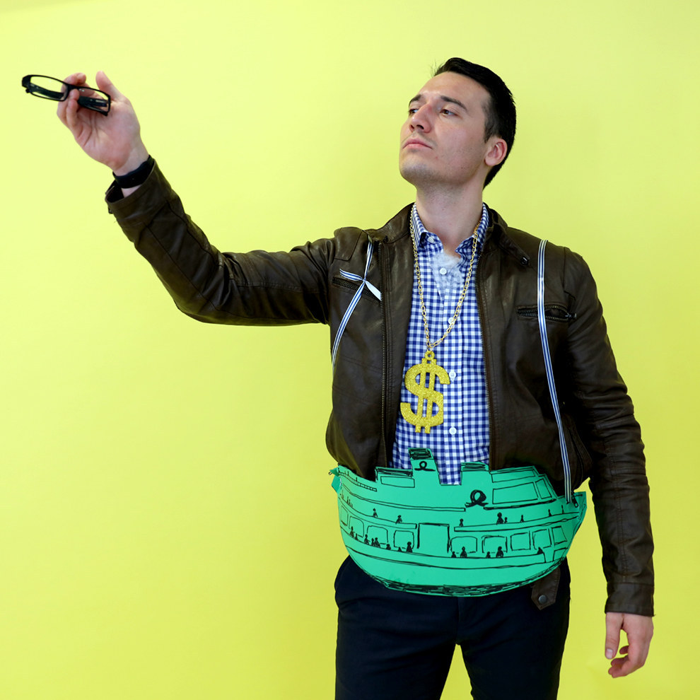 Always wanted to be rich and famous but lack both the wealth and notoriety? Use Halloween as your one day in the year to experience the lifestyles of the rich and famous, just like Malcolm Turnbull!WHAT YOU NEED:- Cardboard ferry- Glasses for gesticulating- Money necklace- Brown leather jacketMAKE IT SEXY:- Undo a few more shirt buttons and show off that silver chest hair.- Imitate the splashes of ocean water from the ferry by pouring champagne all over yourself.- Splash that cash daddy