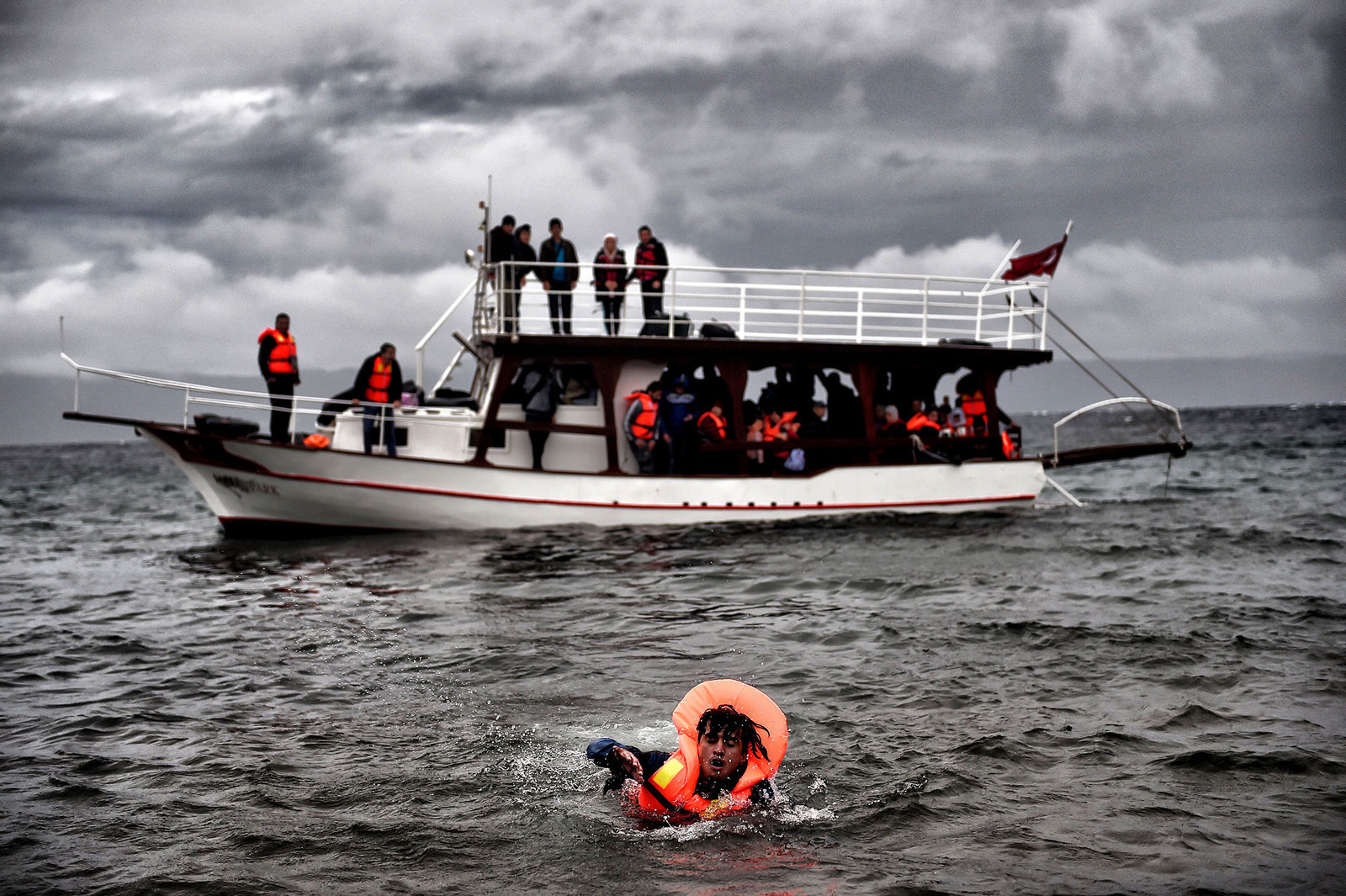 Refugees and migrants arrive at Lesbos island after crossing the Aegean sea from Turkey. An EU scheme to relocate asylum seekers from overstretched Italy and Greece could grind to a halt just two weeks after it began if member states fail to meet their obligations, an EU source said.