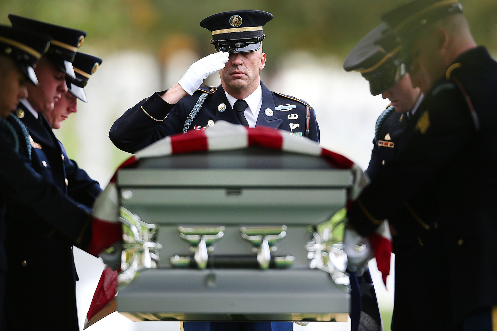 Members of the Army's Old Guard carry the casket U.S. Army Cpl. Robert E. Meyers during a burial service for Meyers at Arlington National Cemetery in Arlington, Virginia. Meyers, whose remains were only recently identified due to advances in technology, was declared missing in action in December of 1950, after his unit was involved in combat operations near Sunchon, North Korea.