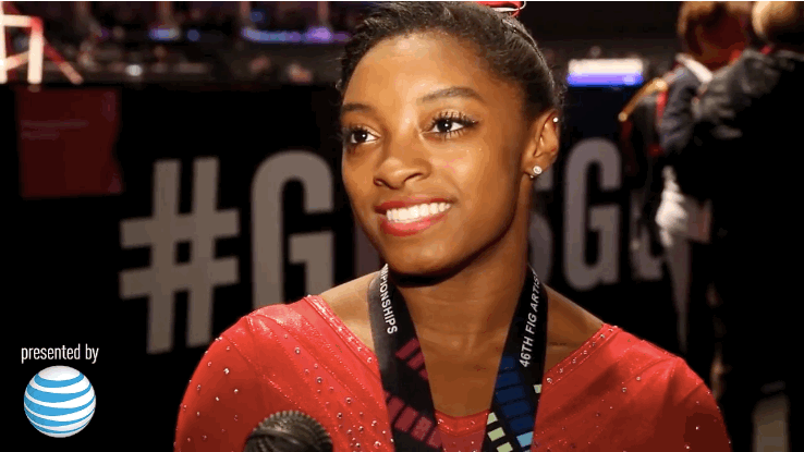 The background of her phone reads, "Blow your own mind." Biles told reporters, "I think that's what I did."