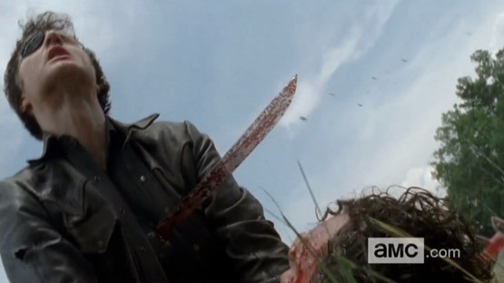This is her killing The Governor (the bad guy) who was trying to kill Rick Grimes (the not-so-bad-good-guy-with-some-issues) aka: her man.