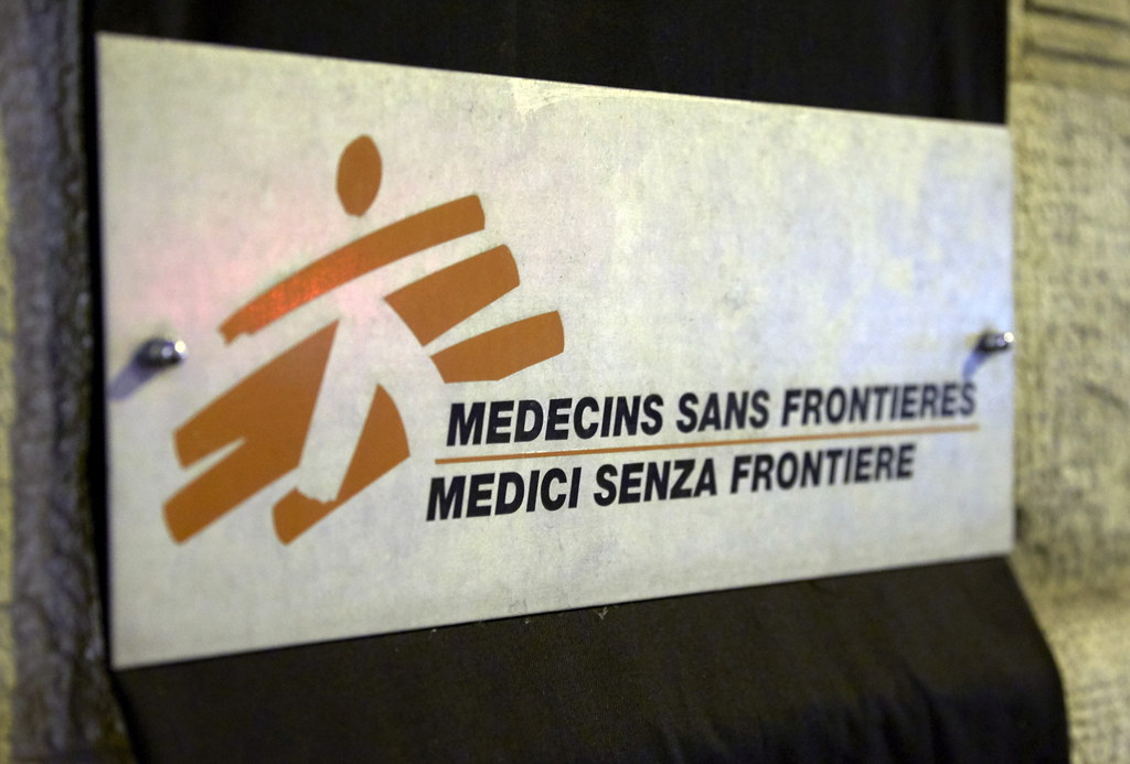 A sign is pictured over a black sheet outside the Doctors Without Borders (aka Médecins Sans Frontières) headquarters in Geneva, Switzerland, Oct. 7.