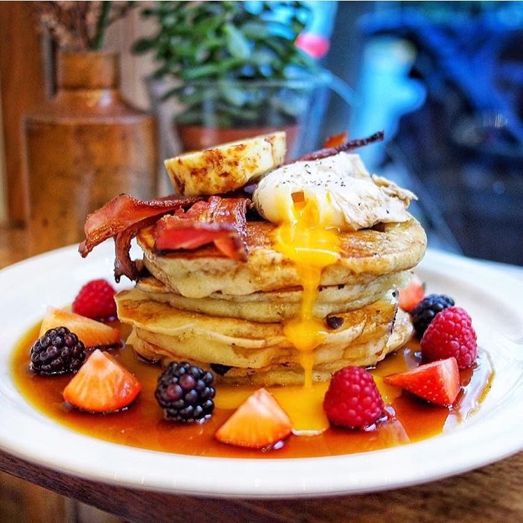 The pancakes at north London's Sunday are a treat any day of the week. Topped with fruit, bacon, and honeycomb butter the stack is a perfect blend of savoury and sweet, and will keep you going all day long.