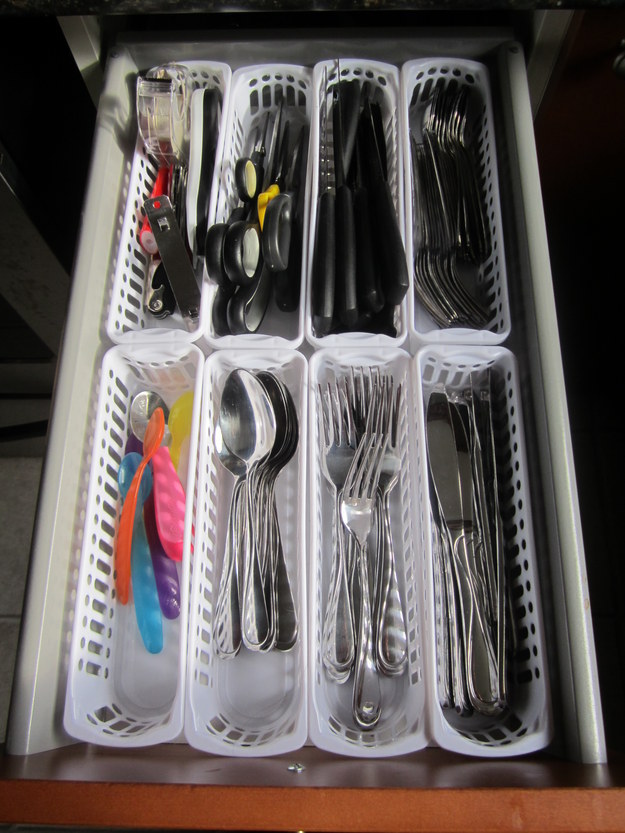Use small baskets to clean up your cutlery drawer.