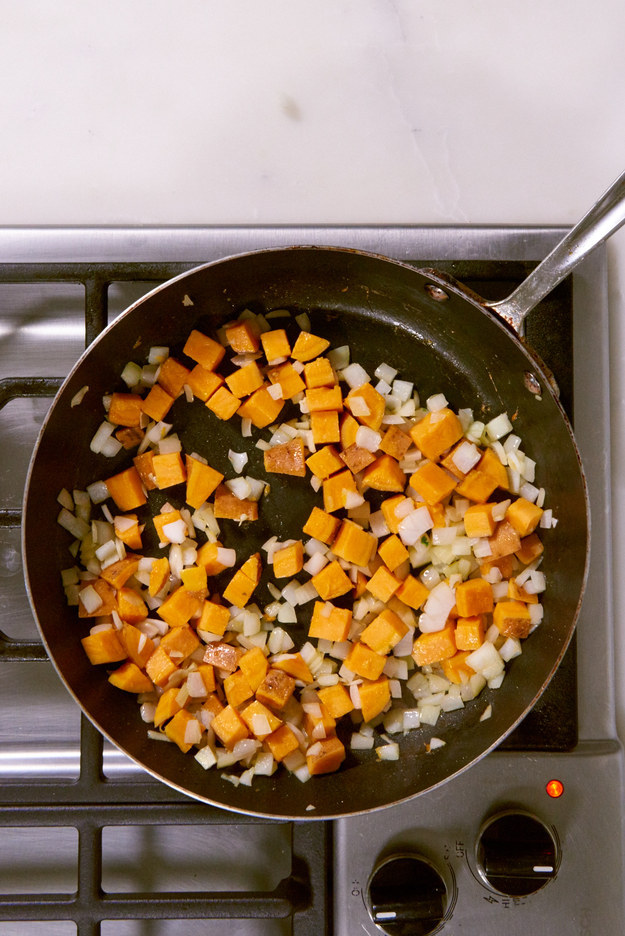 Add olive oil, onion, and salt and pepper, and cook until the onion starts to soften.