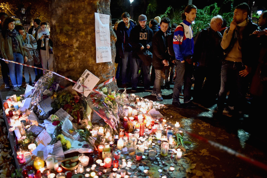 Candles and tributes left opposite the main entrance of Bataclan concert hall.