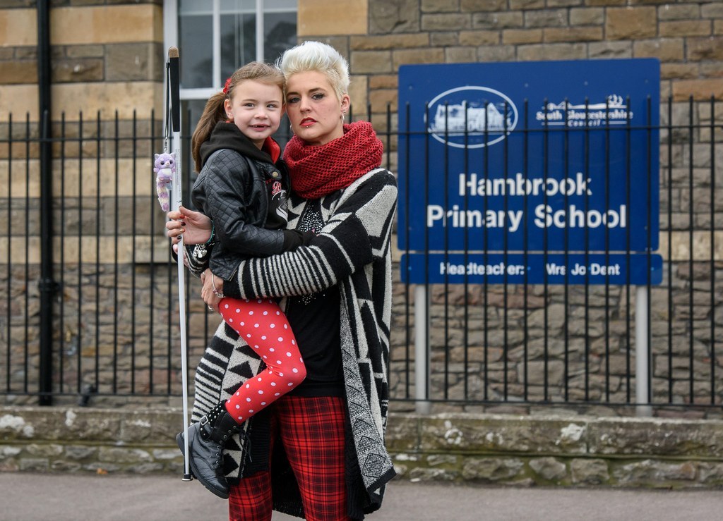 Kristy Hooper with her 7-year-old daughter Lily-Grace Hooper in front of Hambrook Primary School.