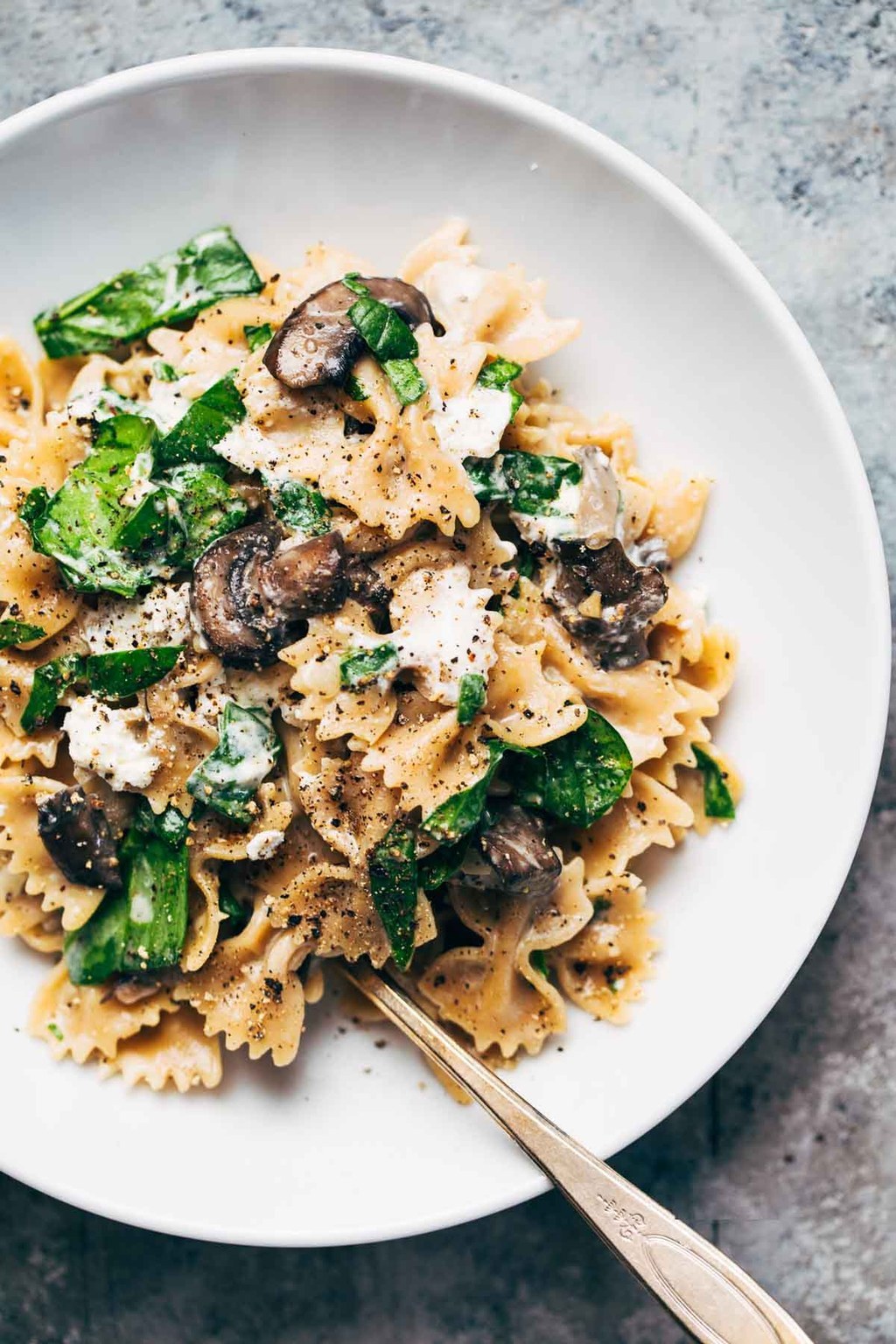 farfalle with mushrooms, spinach, and goat cheese
