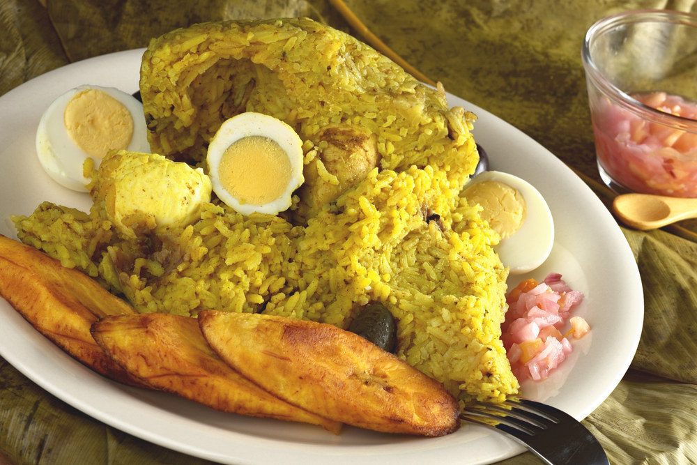 A blend of rice, egg, olive, and chicken, baked in a bijao leaf, this Peruvian classic is not to be missed!