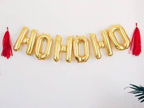 Add a bit of fun to your decor with gold foil letter balloons. The best part is that you can make the banner say whatever you want, like your company's name or "Happy Holidays."