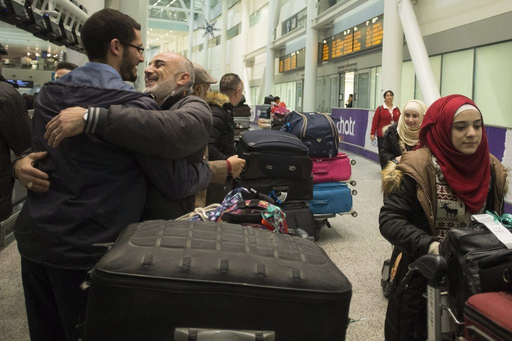 The 19 Most Powerful Photos Of Refugees Coming To Canada 