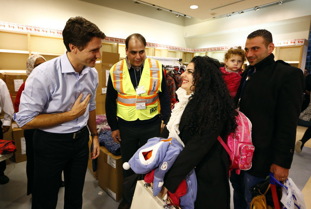 Canada's Prime Minister Justin Trudeau had already sent plenty of hearts fluttering when he took office last month, but took his good-guy reputation to new heights on Thursday evening by personally welcoming a government plane full of refugees to Toronto.
