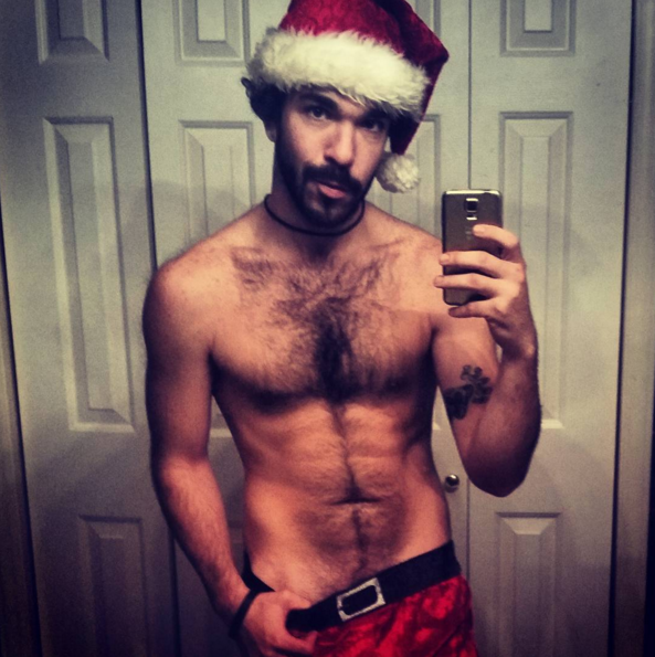 Literally Just A Bunch Of Shirtless Dudes Wearing Santa Hats