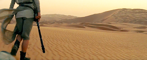 Rey is in search of a purpose, fulfillment, and belonging. Her struggle to recognize her own self-worth is one that we’ve all experienced at one point or another; if we look past the droids and Jedis and everything else that comes with the epic Space Opera that is the Star Wars saga: we notice that Rey’s loneliness is more relatable than not. She spends her days awaiting the indefinite return of the family that abandoned her (even though it was probably for her own protection) and the majority of her time scavenging Jakku for useless trinkets and parts to trade in for food; she lives merely on a day-to-day basis, in pursuit of something more, but initially without the means to facilitate a change. She is lonely and stuck in a routine that seemingly has no end. This is no more apparent than when we see her scrubbing her finds of the day before she trades them in – as she watches an old woman across from her doing the exact same job she is doing, and probably has been doing for the majority of her life. As Rey wonders if the fate of that old woman will become her own, we really sympathize and understand the pain of a space-orphan from a galaxy far, far away. Maybe it’s your job. Maybe it’s your relationship. But knowing you’re meant for something more and not necessarily having a way to change things is heartbreaking. We’ve all been there.
