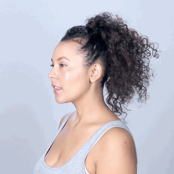 How to get the look:1. Divide the hair so that you 4 sections stacked vertically.2. Tie each section into a ponytail at the back of your head. To help keep the sides slick apply DevaCurl No-Poo Quick Cleanser. 3. Connect the pony tail sections using bobby pins to create the “hawk” shape.