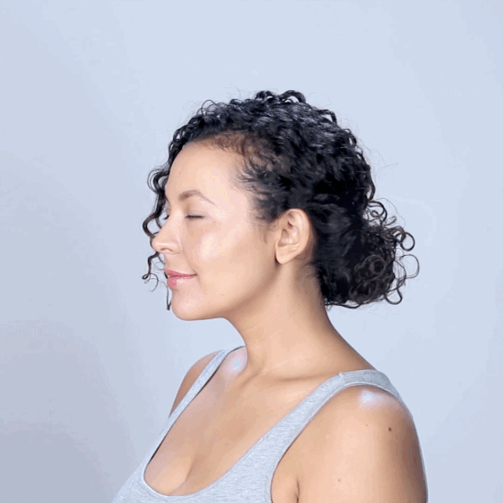 How to get the look:1. Divide hair into small sections in the back. 2. Slowly roll each section of curls inward, guiding them up towards the nape of your neck. Secure each roll with bobby pins.3. Once all sections are pinned up, pull the sections towards each other to blend, securing with additional bobby pins if necessary. 4. Use a hair pick to push in any loose curls. Then use the pick to add volume to the crown of your head.