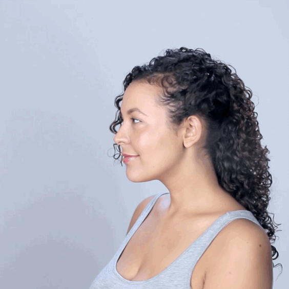 How to get the look:1. Take a small top layer of your hair and clip up and away.2. Slick back both sides of your hair, and secure with either a ponytail or bobby pins. You can smooth down the sides using DevaCurl Styling Cream.3. Unclip top section and flip over the pinned hair.4. Tease top of hair with fingers for added volume.