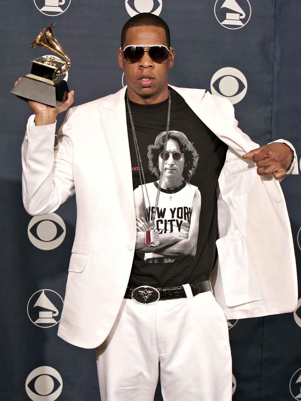Graphic tee: check, ill-fitting suit: check, ridiculous jewelry: check, Grammy: check.
