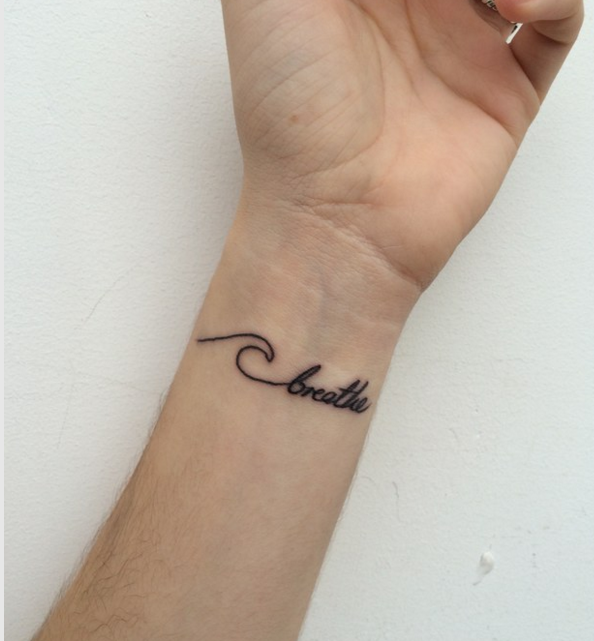 wave with the word breathe tattoo