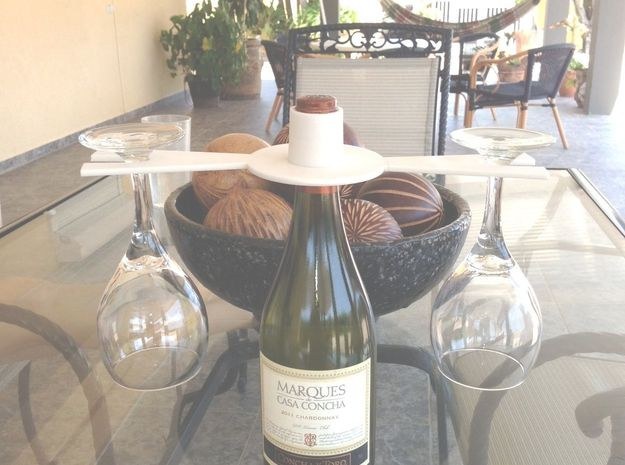 This simplistic contraption can hold your favorite bottle of vino, and two glasses for you and a friend. Or maybe just you.Organize yourself here for $50.73