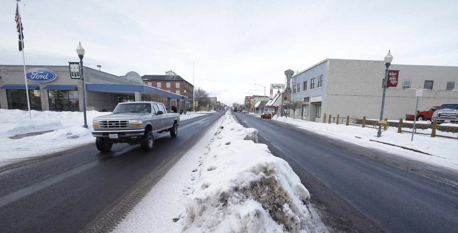 A truck travels down a street Monday, Jan. 4, 2016, in Burns, Ore.