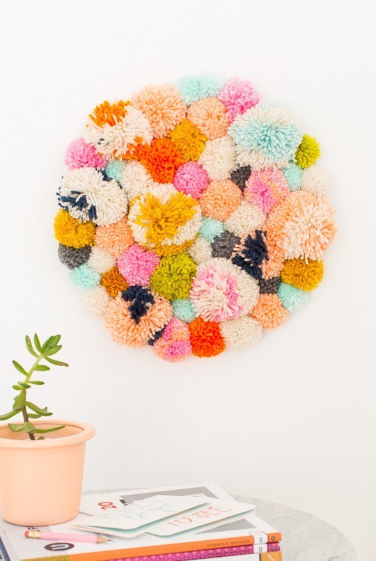 Bundle up some pom-poms to create this textured decoration.