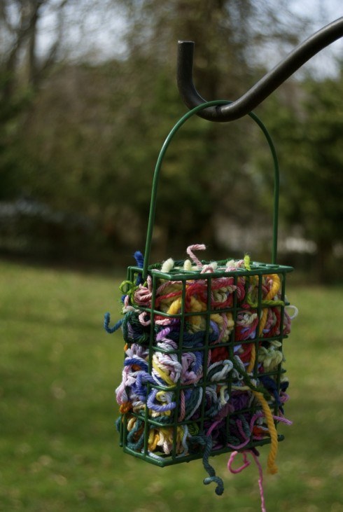 If you're totally done with your scraps, leave them in a bird feeder and watch colorful nests start popping up in nearby trees.