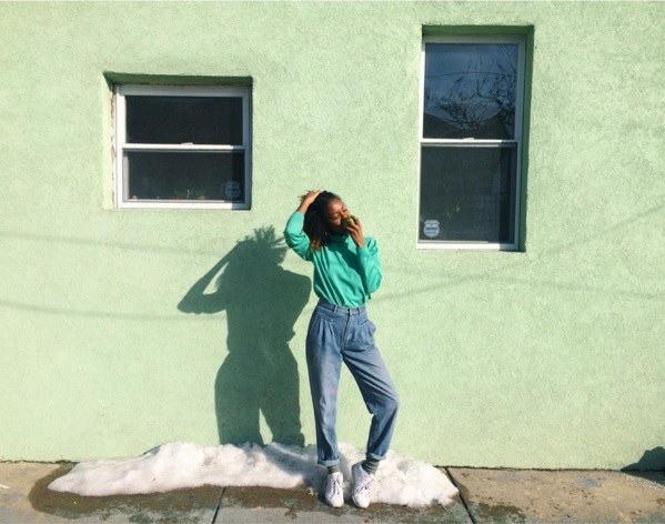 She is a Washington DC native, an artist, and a girl power enthusiast.