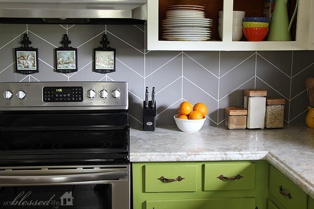 If plastic or peel and stick isn't really your thing, you could always paint your backsplash with a cool pattern.