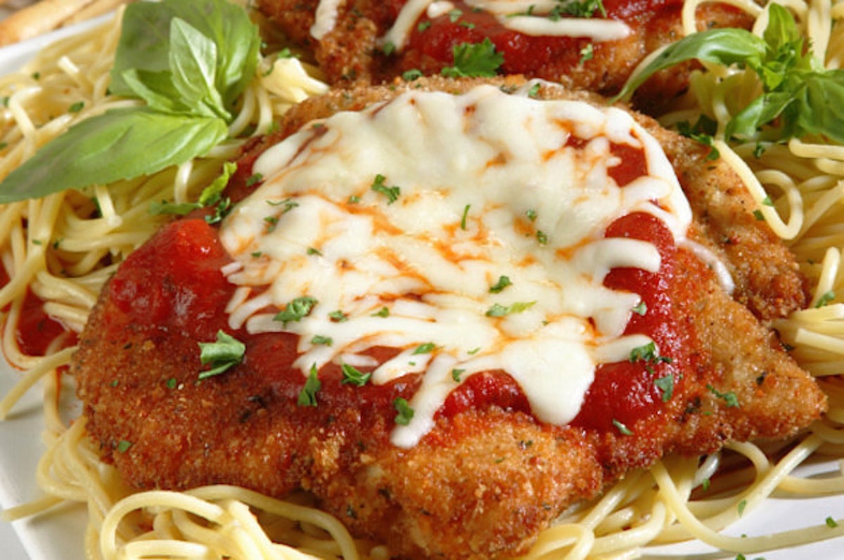 Some Parmesan Cheeses You're Eating May Be Full Of Wood Pulp