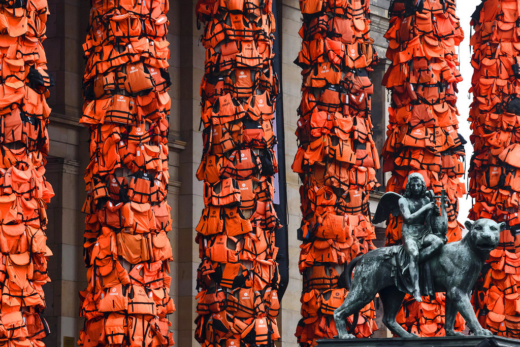 An art installation by Chinese artist Ai Weiwei consists of life vests worn by refugees and is bound to the columns of the concert house in Berlin, Germany. The life vests were among the thousands discarded by migrants and refugees after they crossed the sea from Turkey to Greece. Up to 80,000 refugees currently live in Berlin and the city is preparing for the likely arrival of 30,000 more in 2016.