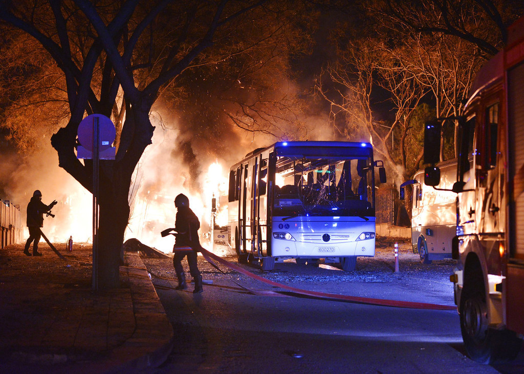 Firefighters work to extinguish a fire after a suicide blast in Ankara, Turkey on Wednesday. At least 28 people were killed and 61 injured in a blast that Turkey’s prime minister blamed on Syrian Kurdish groups.