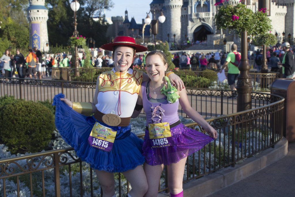 I made the Jessie costume, on the left, and Sam made her Rapunzel ensemble. (We are obviously v competitive runners since we stopped for this photo op...)