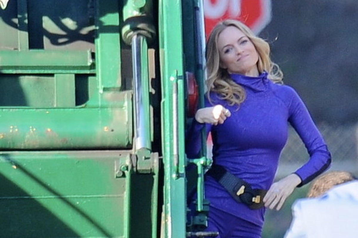 Heather Graham Rides A Garbage Truck, Remains Perfect