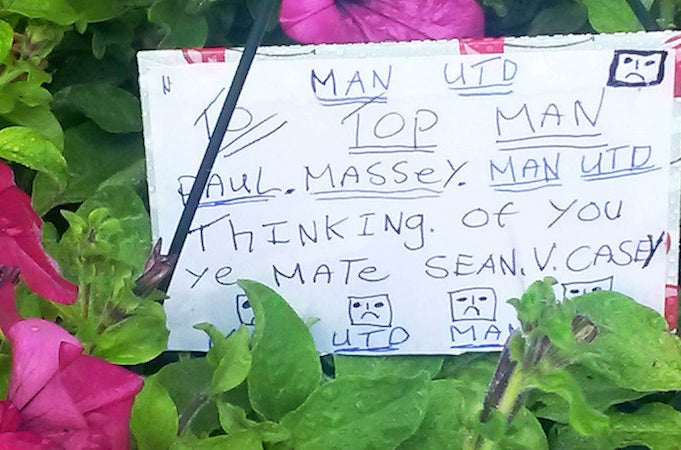 Tributes left outside Paul Massey&#x27;s house after his death in July 2015