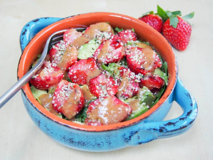 Roasted strawberry salad with tangerine-hatch chili dressing