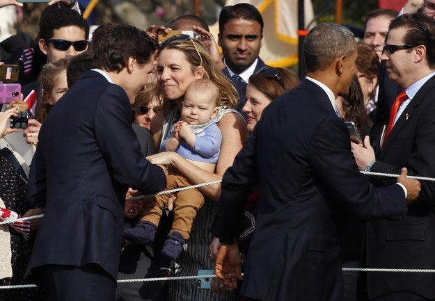 They worked the crowd together, with Trudeau going straight for the baby moment.