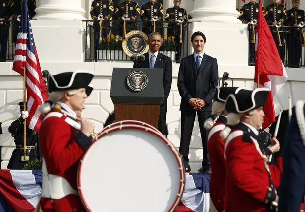 The leaders watched as men in hats with large drums passed by, perhaps symbolizing the beating heart of Canada-U.S. relations â€” and that time we beat the Americans in the War of 1812.