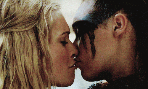 For starters, The 100 is a show that prided itself on its "groundbreaking" equal treatment of queer characters and "revolutionary" subversion of tropes. When Lexa was first introduced in season two, fans were immediately drawn to her strong character and picked up on the undeniable chemistry between her and Clarke, the female protagonist of the show. Many assumed this relationship would be kept in the subtext-zone, as neither characters' sexualities had been labeled, and Clarke had only been romantically linked to guys up until that point. However, that all changed in the episode 'Remember Me', when Lexa subtly referenced a lost love, Costia, who was a woman. From that point on, the Clexa ship took off full steam ahead. In 'Bodyguard of Lies', Clexa officially went canon when Lexa initiated a kiss with Clarke, who wholeheartedly reciprocated before stating that she wasn't ready to be with anyone… yet.