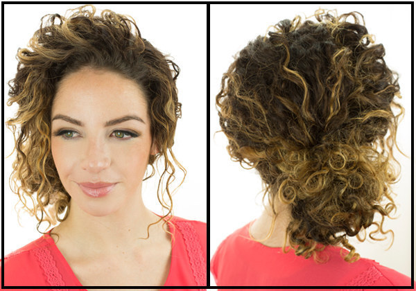 Gather your hair into a loose low bun and sweep curls back from your face for an effortless look.