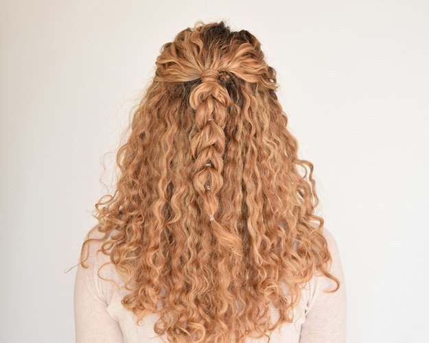 Amp up your half-back hair with a pull through braid.