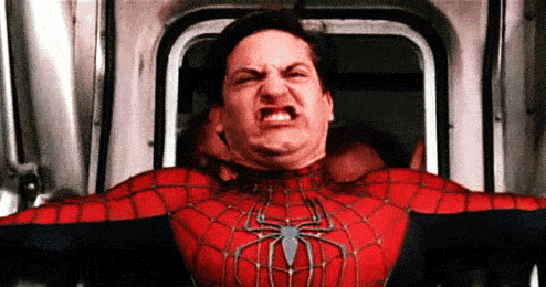 Spider-Man making a cringey face while trying to save a subway car