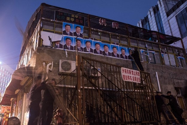 As Xi's photos got ripped off, more Chinese characters reveal ads for "Makeup, nail polish, cosmetics, manicure, braiding." Like we said, this is a real diverse business scene. What a shame that they will be all gone soon.